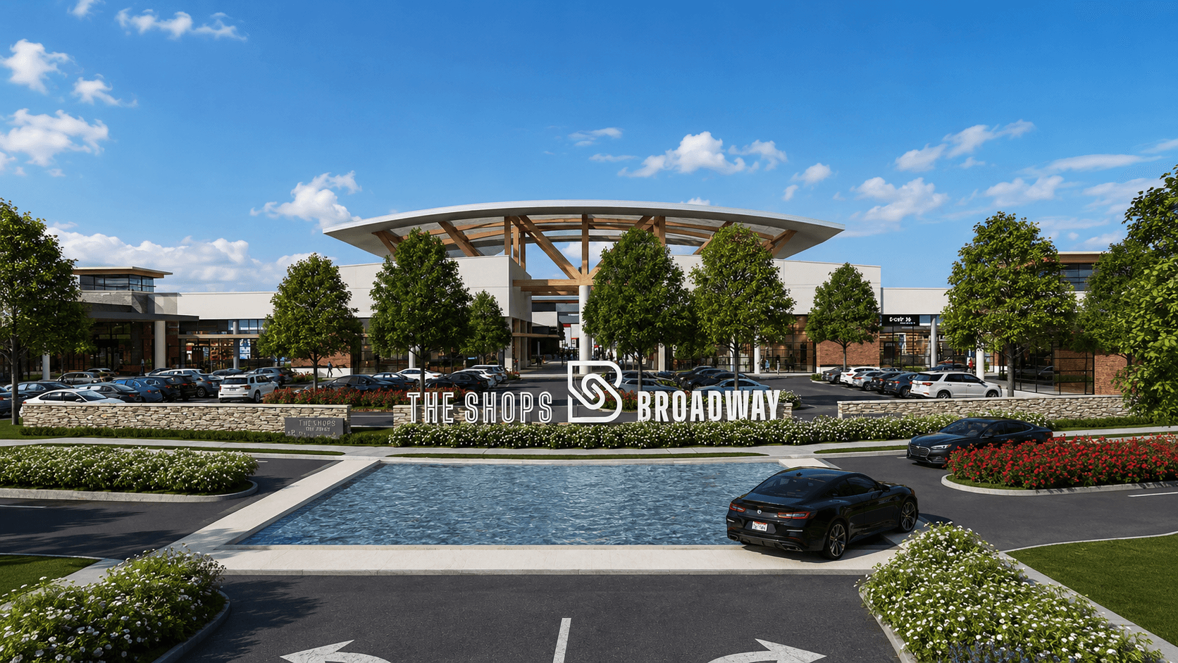 The Shops on Broadway — main entrance with reflecting pool and signage